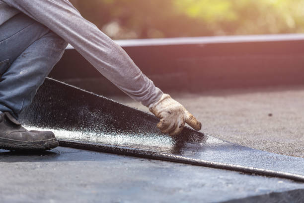 Professional Basement Waterproofing technician working in Ney, OH